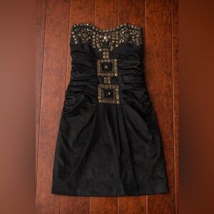 Lulumari Elegant Black Mini Dress with Gold Accents